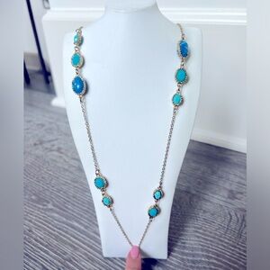 Long necklace with blue pendants